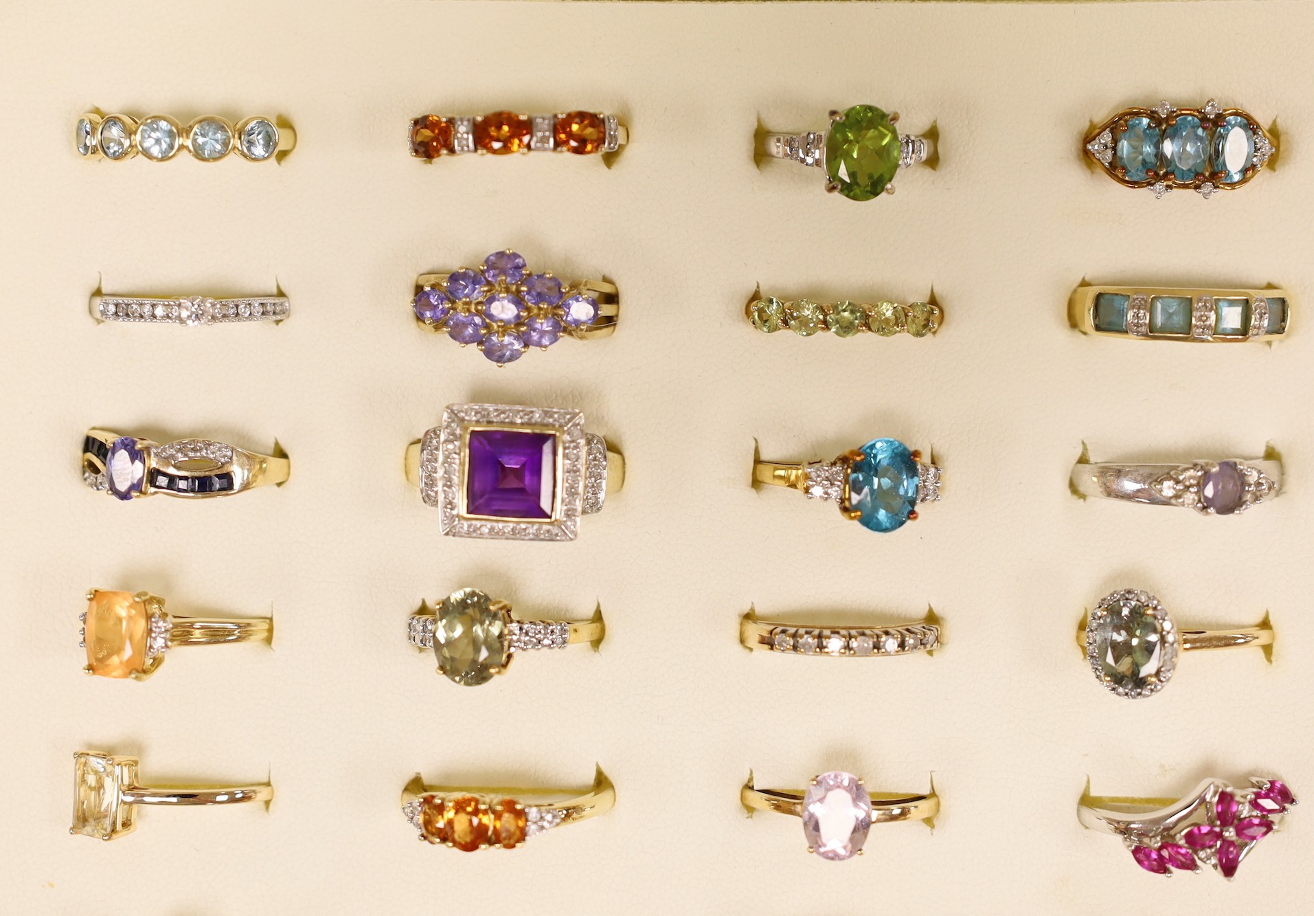 Forty seven assorted modern 9ct gold and gem set dress rings, including amethyst, citrine and garnet, two stamped 10k and one 9k and three 18ct gold and gem set dress rings, in ring box.